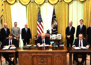 塞科簽署歷史性協議 —— 當勞侵特色的外交政策